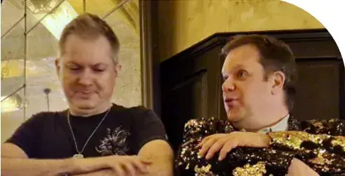 Two team members in conversation